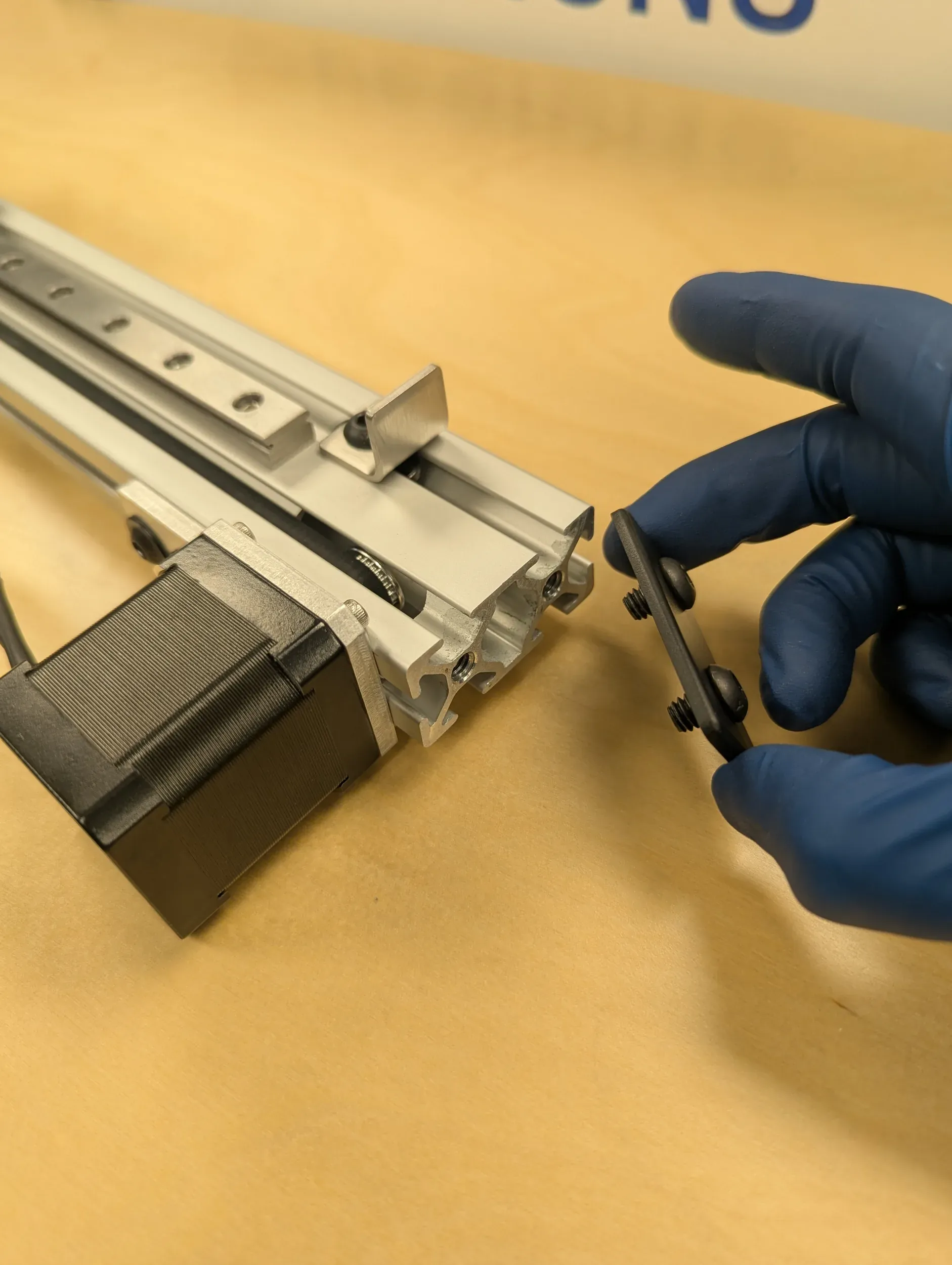 Assembling a belt-driven linear actuator in the shop